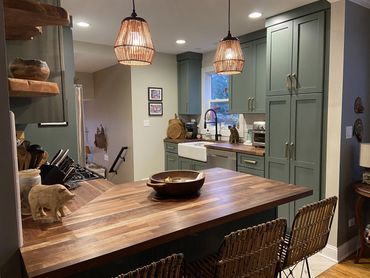 Kitchen Remodel with Green Cabinetry and Walnut Countertops