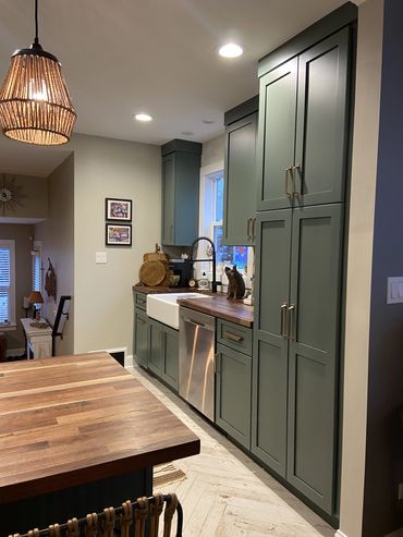 Kitchen Remodel with Green Cabinetry and Walnut Countertops