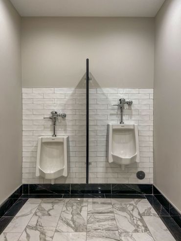 Commercial bathroom remodel urinals'