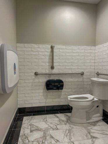 Commercial bathroom remodel handicap stall