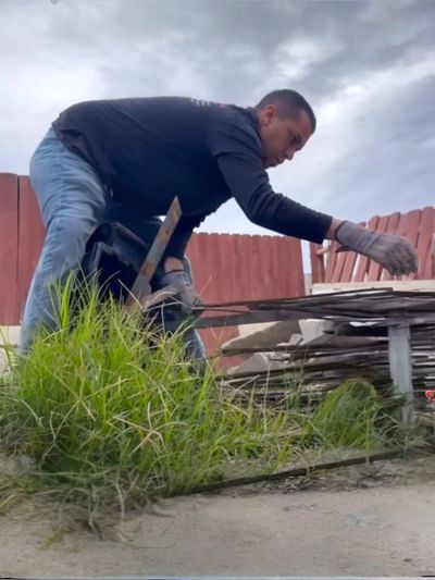 Martel's junk removal specialist removing trash from residential area in Cathedral City California