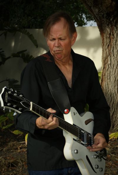 Brent Bennett with white Gretsch guitar