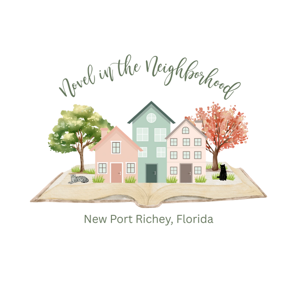 Illustration of three houses and trees on an open book with cats around.