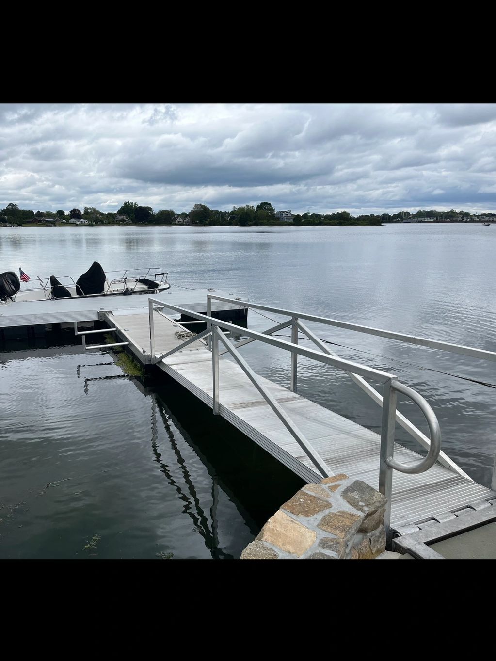 Full custom system. Gangway down to dock with kayak arms to keep them elevated with a T-Dock.