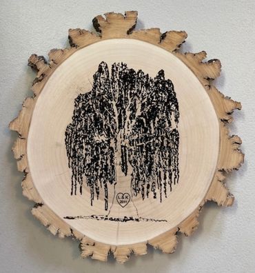 Willow Tree with names and dated engraved in trunk.
