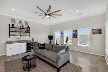 Game room with wet bar and great views of the ocean.