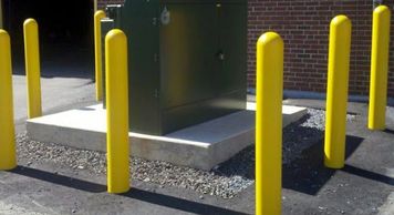 Yellow parking lot bollards Bakersfield California