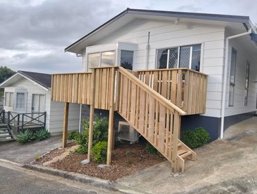 Completed timber deck and stairs at a weatherboard home in Onerahi.