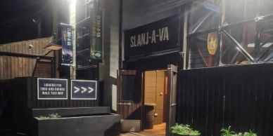 Entrance to Slanj-A-Va venue at night.