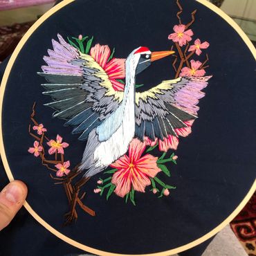 Embroidery of crane and cherry blossoms