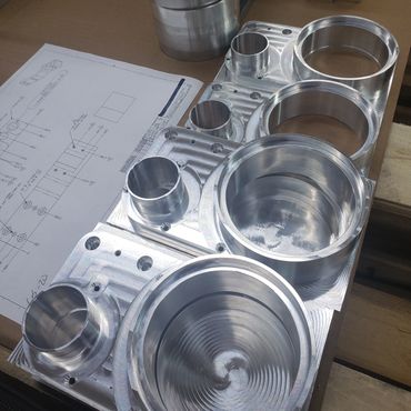 CNC milled part in stages of progress