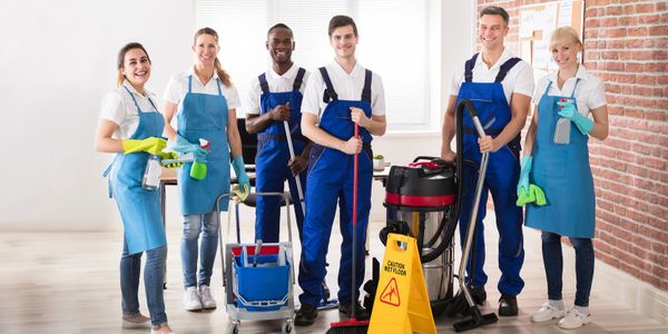 people working in janitorial company, with equipment to clean