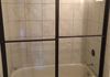 Bypass Sliding Doors on Tub with Oil Rubbed Bronze Finish