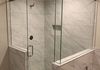 Custom Frameless Door with Double Step Up and 90 Degree Return with Header