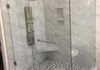 Custom Frameless Shower Door with 90 Degree Return with Towel Bar on Fixed Panel