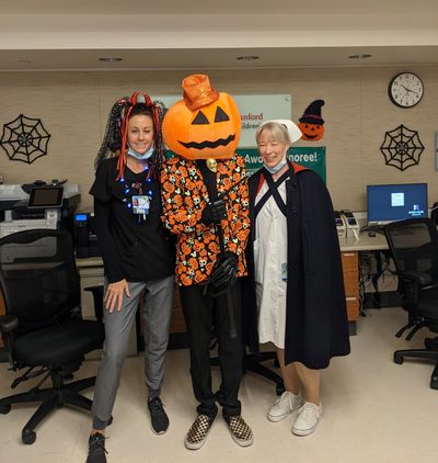 A three people standing on the office and looking ahead