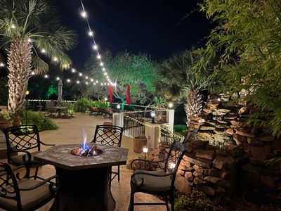 Back patio at night with festive lights