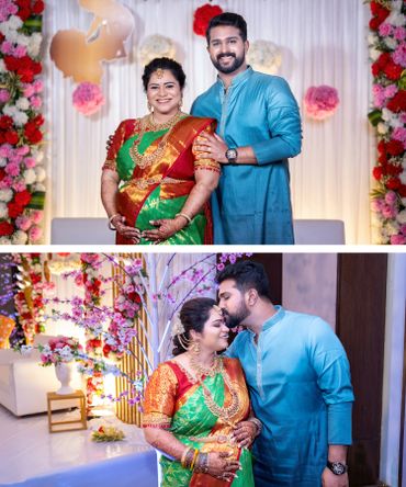 A joyful couple celebrating a traditional event with floral decorations.