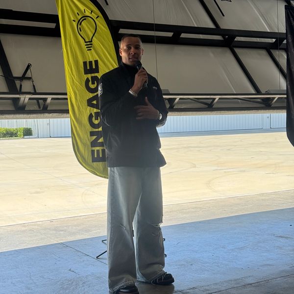 Pharaoh Brown speaking to the youth about his experiences in the aviation space as a hes actively working towards his license whileplaying professional football in the NFL.