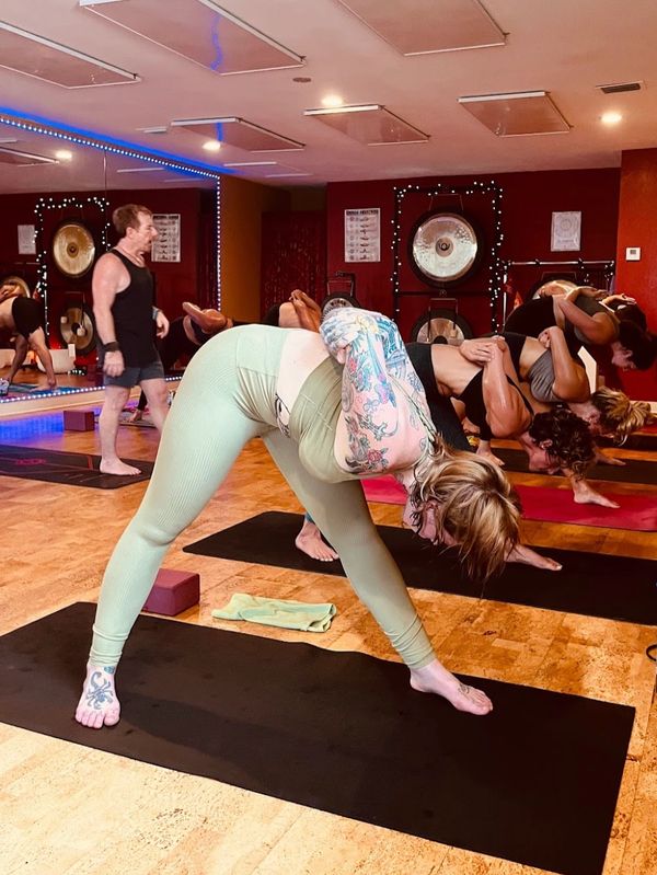 students at prana mudra studio during hot yoga class