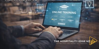 Person using laptop for online training.