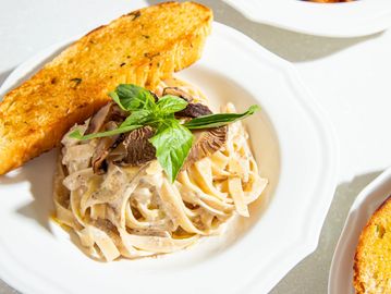 Truffle pasta with cream and basil