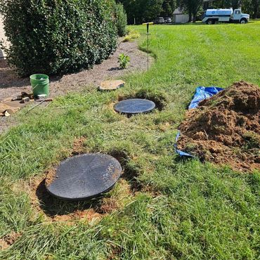 Septic risers in yard