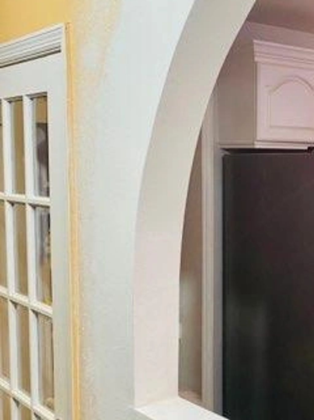 Completed archway between living and kitchen.