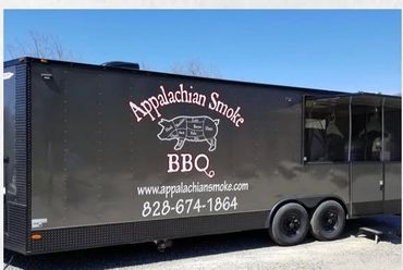 Appalachian Smoke BBQ food trailer with logo and contact info.