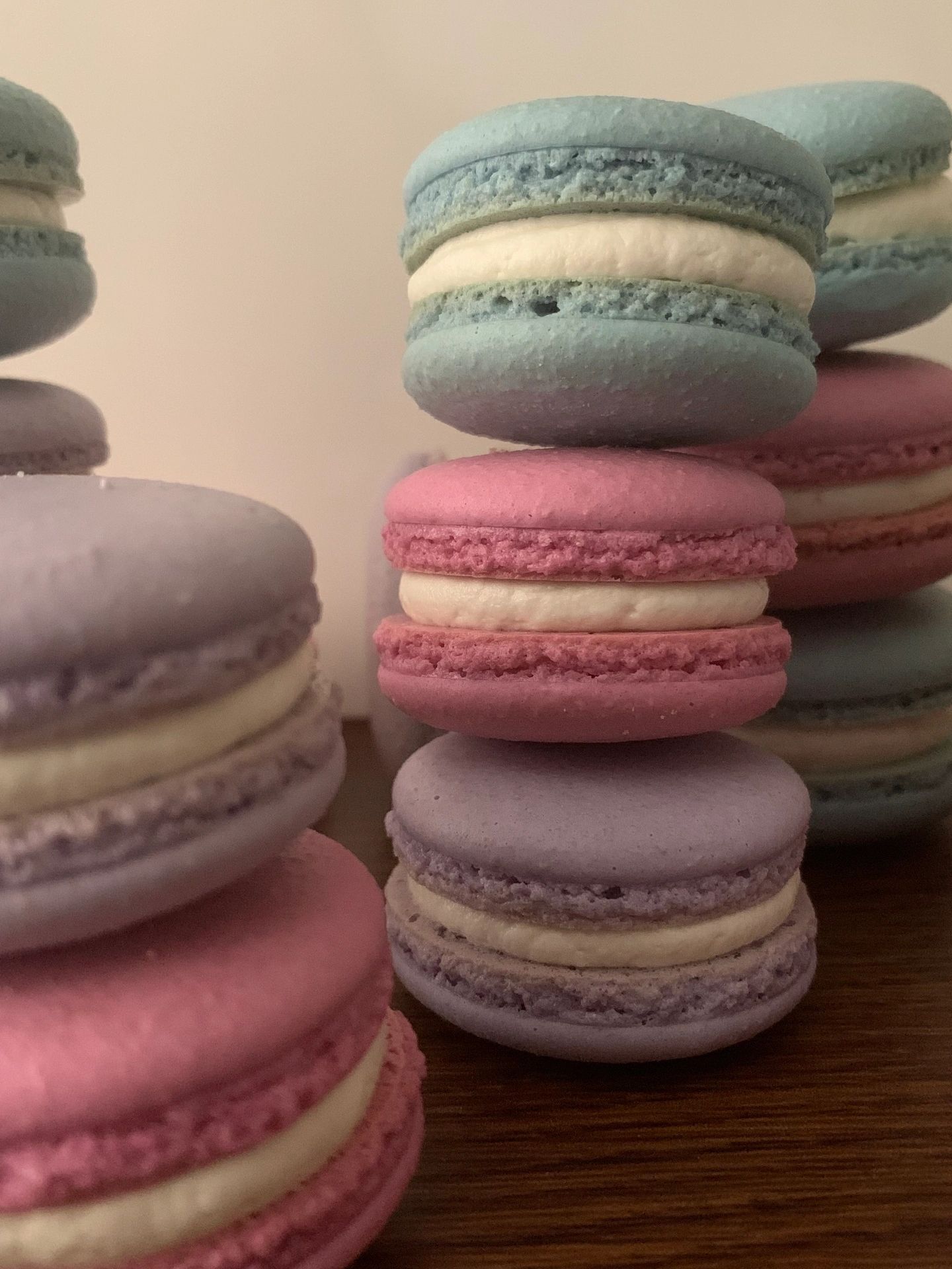 Pink, purple and blue vanilla macarons.