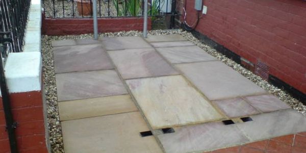 security ground anchor installed in block paving
