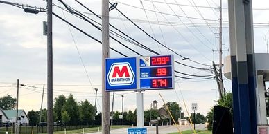 Marathon gas station price sign showing fuel costs.
