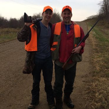 Todd and his son Reese pheasant hunting near their family farm in southern Minnesota