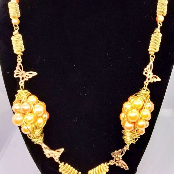 gold pearls with gold coloured copper  coiled wire