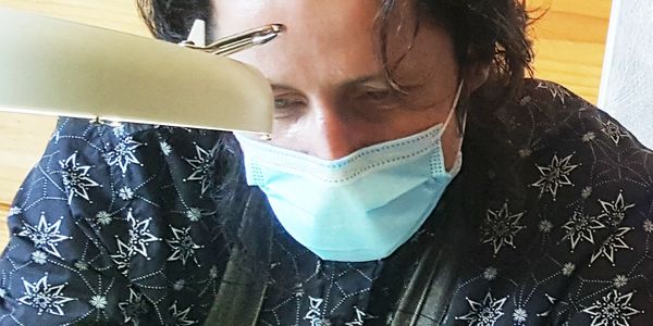 Artist Iva Treskon working on a tattoo