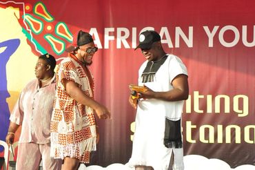 Done Deal International Artist ONEOFAFRICA Accepts The African Youth Tourism Award  with Mr Ayo 