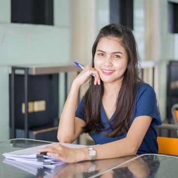 A confident young woman, smiling, Mindfulness, EMDR therapy