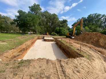 2nd Step, add rock to help level and create the pad for the pool.