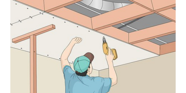 Person installing drywall on ceiling with a power drill.