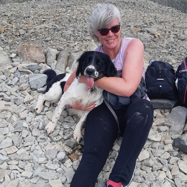 The dog trainer and her best friend on the highest peak in England 