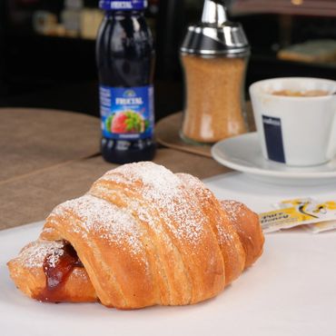 Croissant with fruit jam