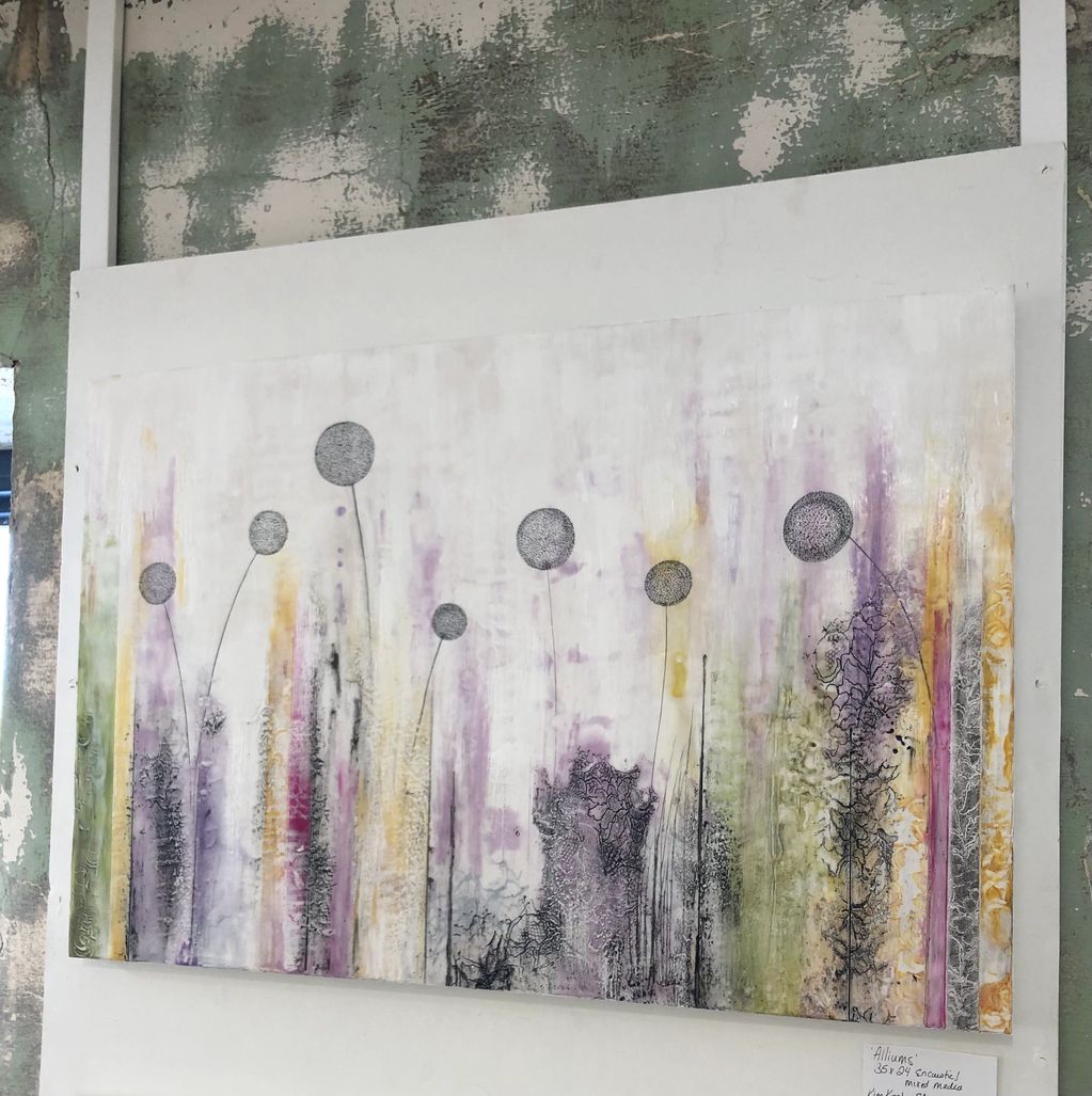 Encaustic with Inks.  Inspired by the Ontario landscape in purples, greens, orange, black, magenta