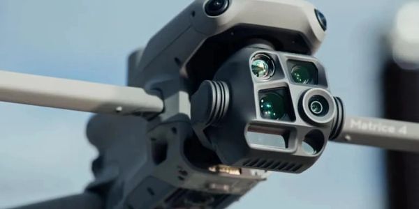Close-up of a drone's advanced multi-lens camera system in focus.