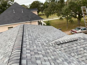 New shingle roof and ridge caps