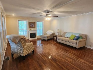 Wooden pier extending into a blue lake.