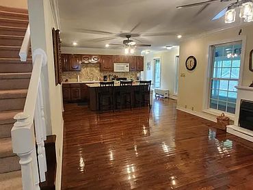 Cozy living area with polished hardwood floors.
