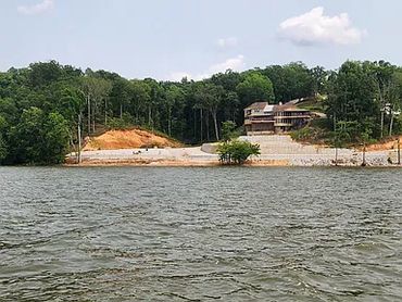View of a waterfront house from water.