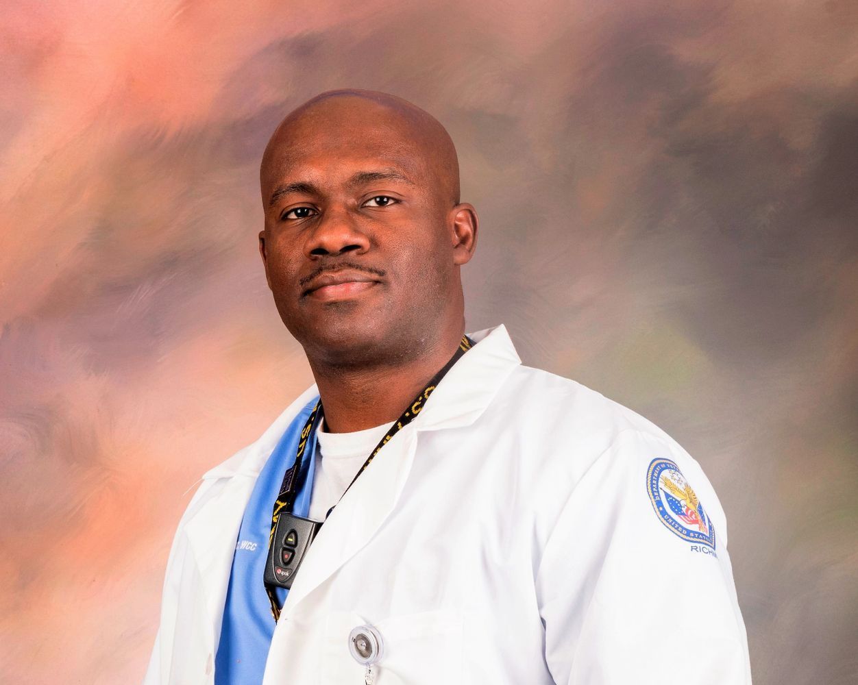 Greggy Lubin profile picture in his white nursing coat
