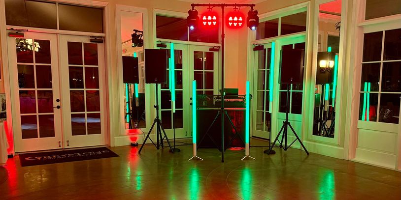 Baton Rouge DJ setup with lighting for private event in clean indoor venue