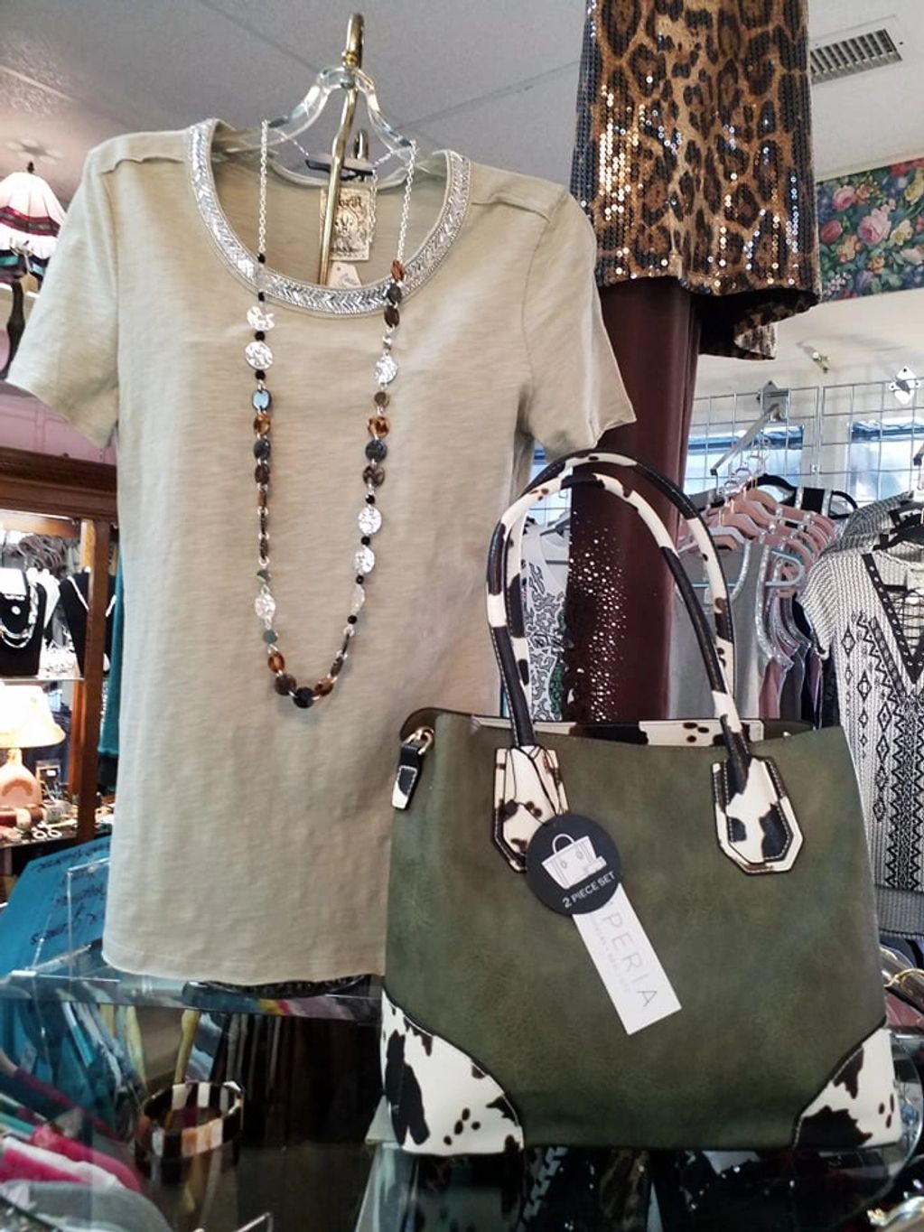 Beautiful Classy Top with Rhinestone Neck and short sleeves, paired with a beautful necklace and han